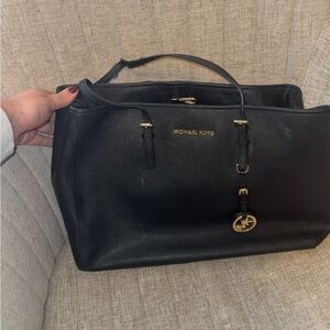 Michael Kors Black Leather Handbag with Gold Accents